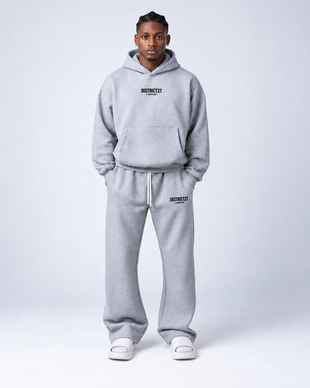 Grey DISTRICT21 logo hoodie, front view, styled with matching joggers